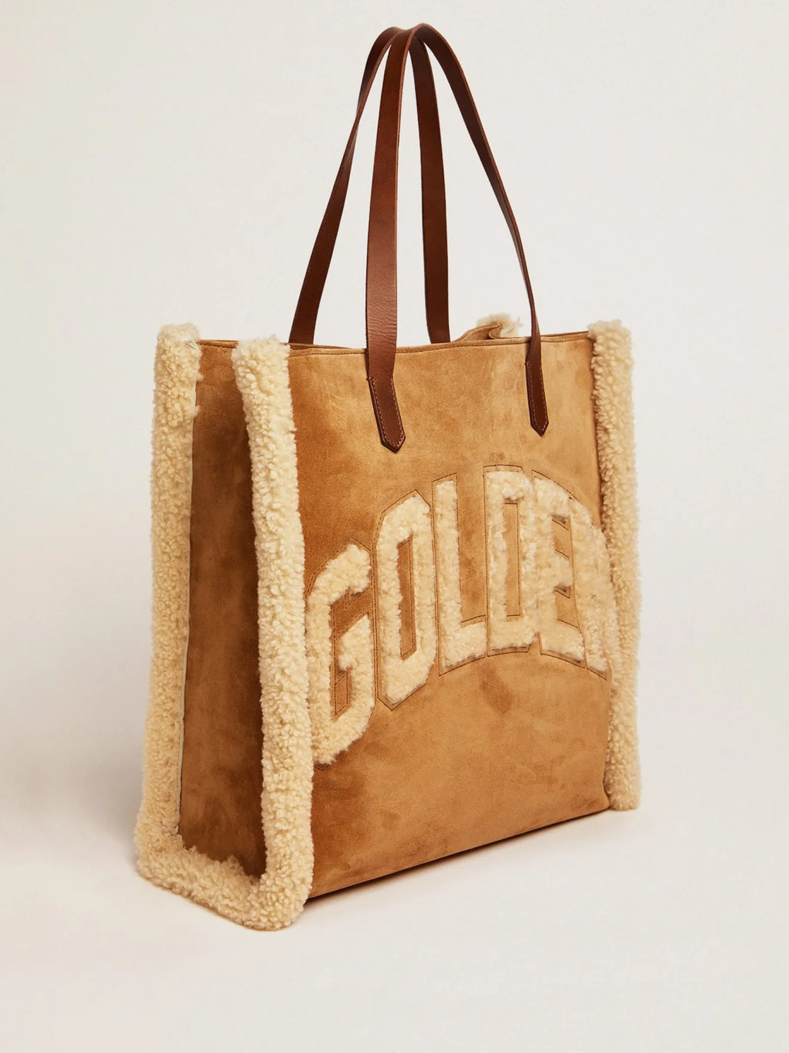 Best Golden Goose Bolsa California North-South de camurça com shearling Material principal: 90% algodão, 10% couro bovino