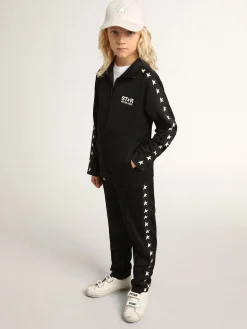 Shop Golden Goose Calça de jogging preta com estrelas brancas em contraste Star Collection