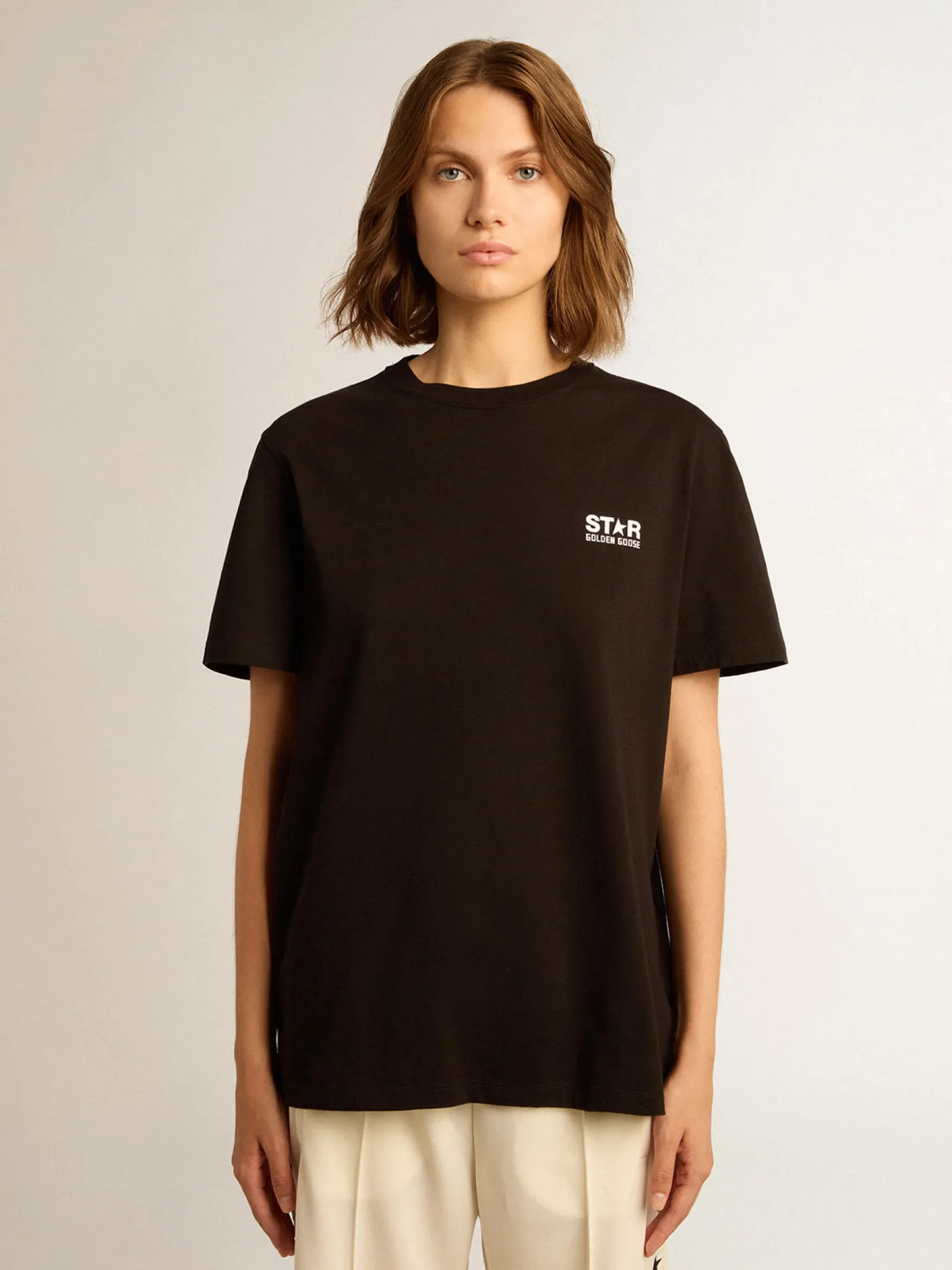Store Golden Goose Camiseta preta Coleção Star com logo e estrela brancos em contraste Cor: preto