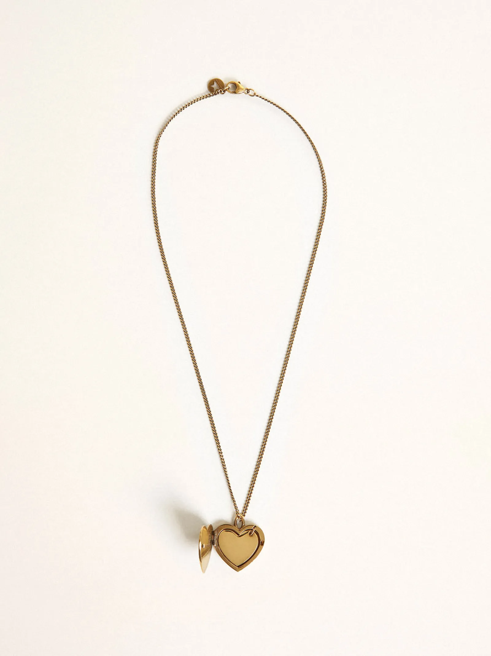 Hot Golden Goose Colar na cor ouro velho com pingente de coração Colar com um pingente em forma de coração que, aberto, revela outro dentro.