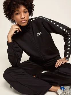 Shop Golden Goose Moletom feminino preto com zíper e estrelas brancas Star Collection
