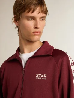 Shop Golden Goose Moletom masculino bordô com zíper, faixa branca e estrelas em contraste Star Collection