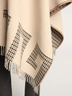 Online Golden Goose Poncho de lã dupla face na cor creme com estampa xadrez e inscrição Cor: creme