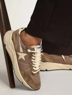Shop Golden Goose Running Sole masculino de tela verde-oliva e couro com estrela creme Cabedal verde-oliva de tela com inserções de couro tom sobre tom