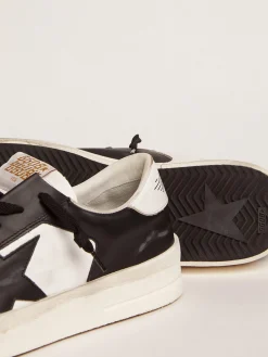 Shop Golden Goose Stardan feminino de couro branco e preto Cor: branco e preto