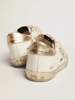 Store Golden Goose Super-Star masculino com reforço dourado brilhante e inscrições Cabedal: 100% couro bovino