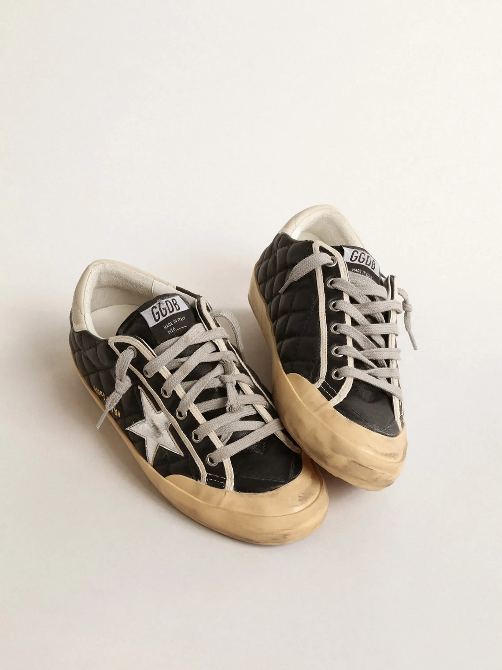 Store Golden Goose Super-Star Penstar de napa matelassê preta com estrela prateada Cabedal de napa preta matelassê